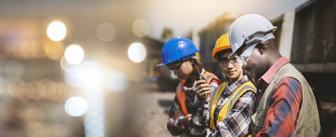 three-workers-on-building-site